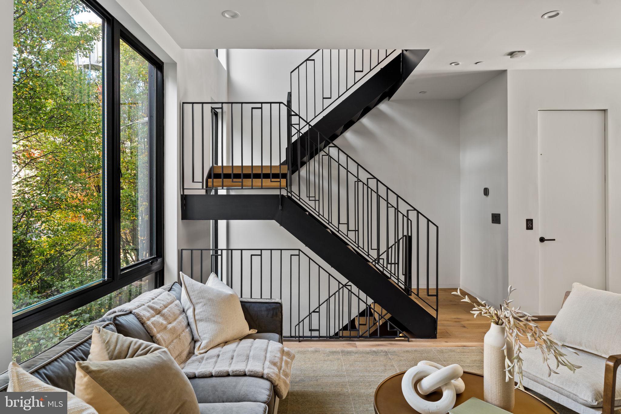 1428 Kenilworth Street Philadelphia, PA 19146 - Photo 9 of 58 a view of entryway and hall with wooden floor