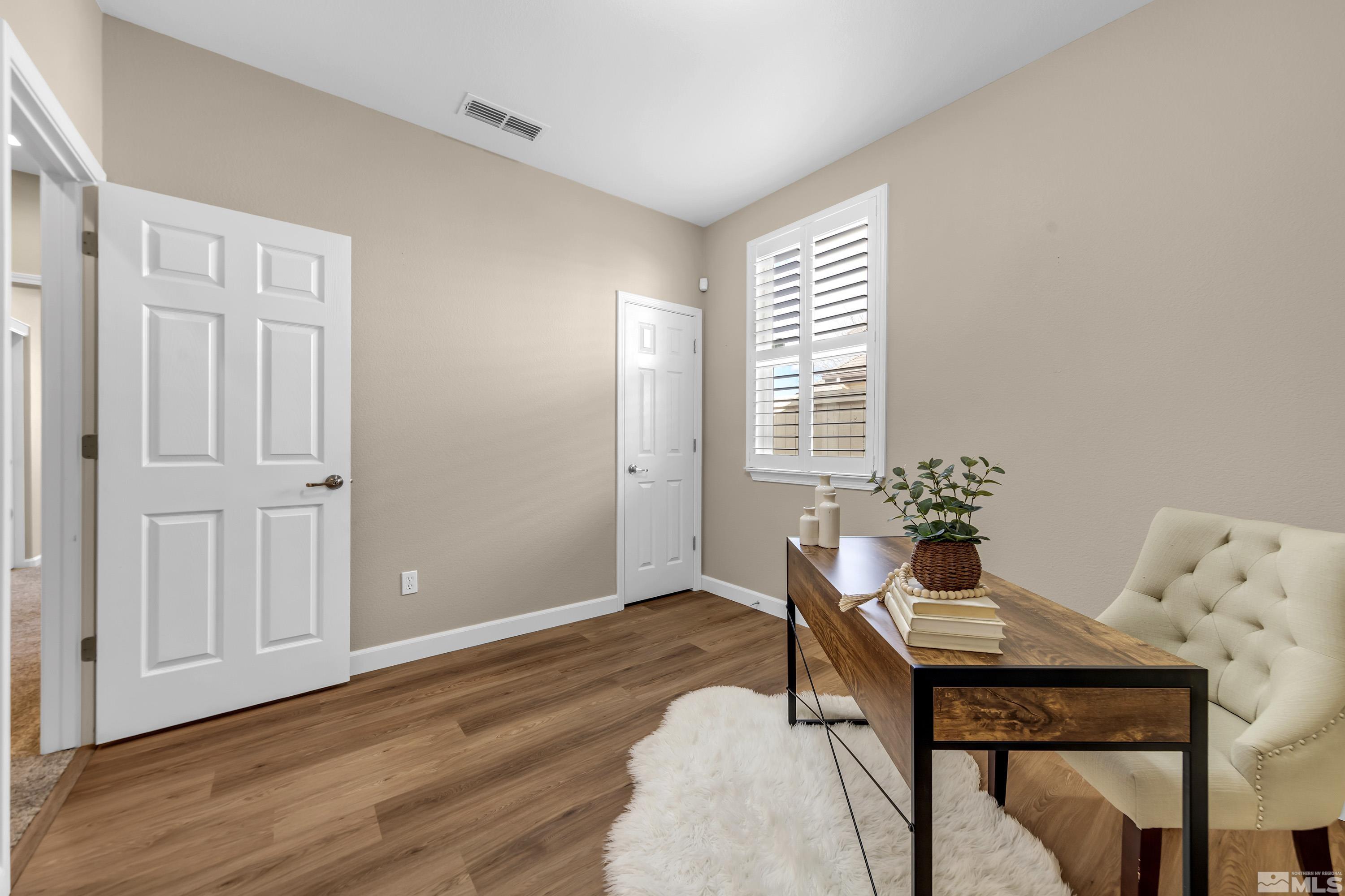 10797 Amber Falls Drive Reno, NV 89521 - Photo 19 of 38 a workspace with furniture and window