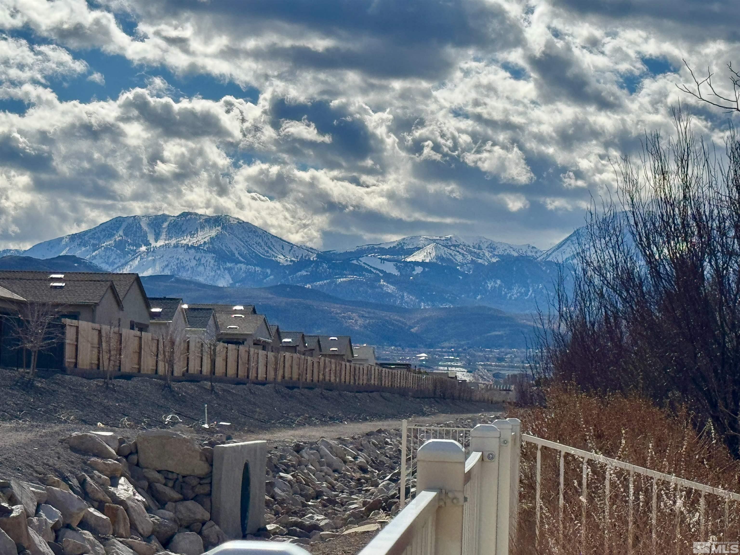 10797 Amber Falls Drive Reno, NV 89521 - Photo 3 of 38 a view of a roof deck with wooden fence