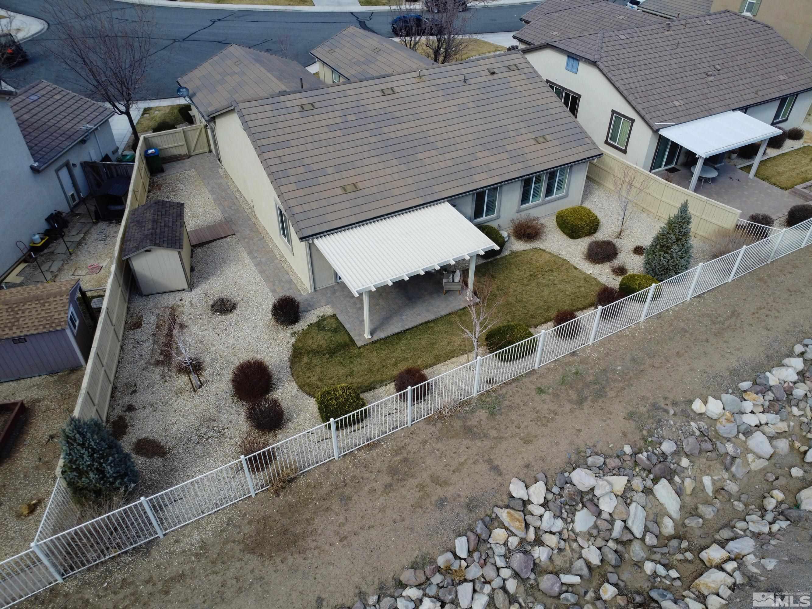 10797 Amber Falls Drive Reno, NV 89521 - Photo 31 of 38 an aerial view of a house with garden