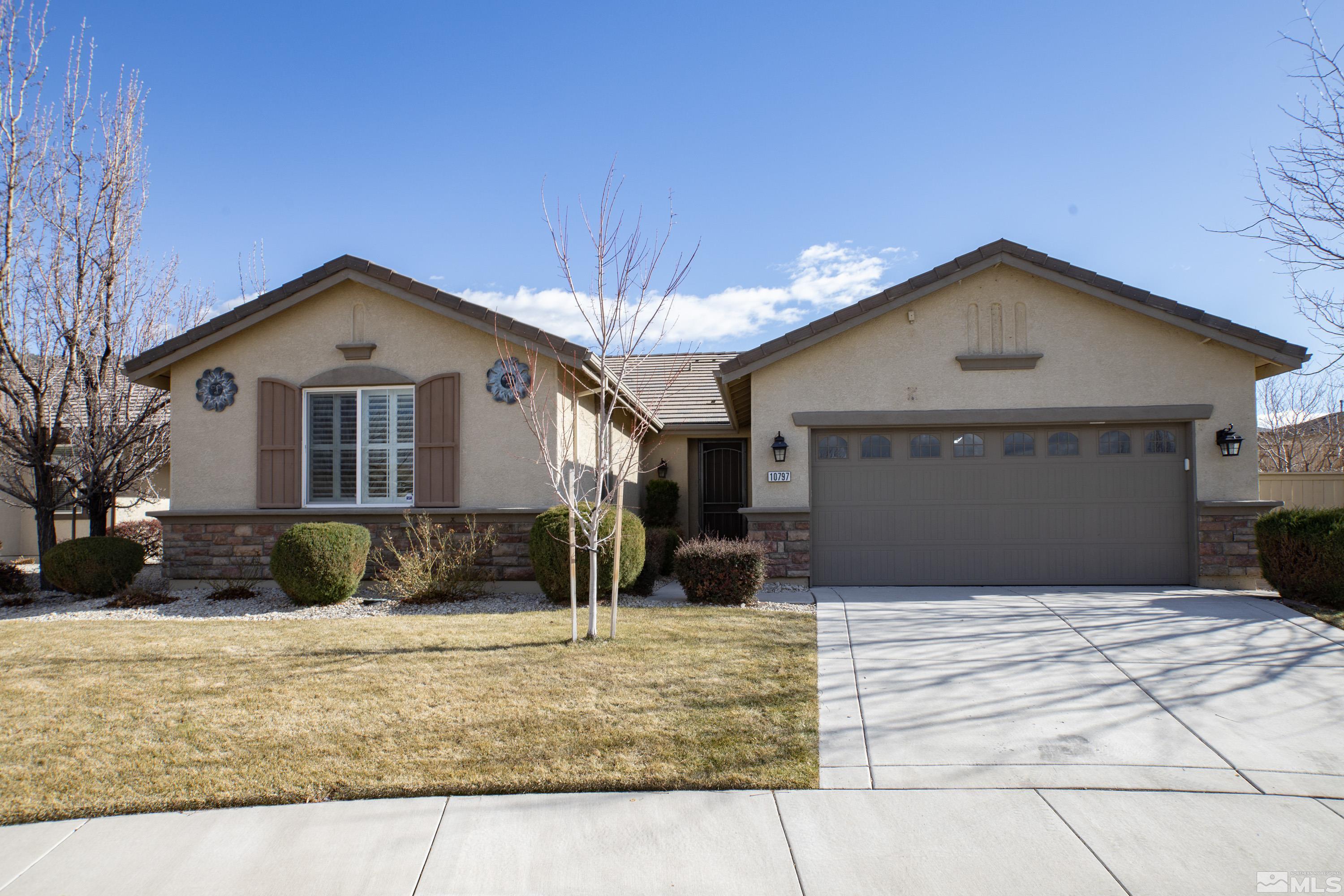 10797 Amber Falls Drive Reno, NV 89521 - Photo 38 of 38 a front view of a house with a yard