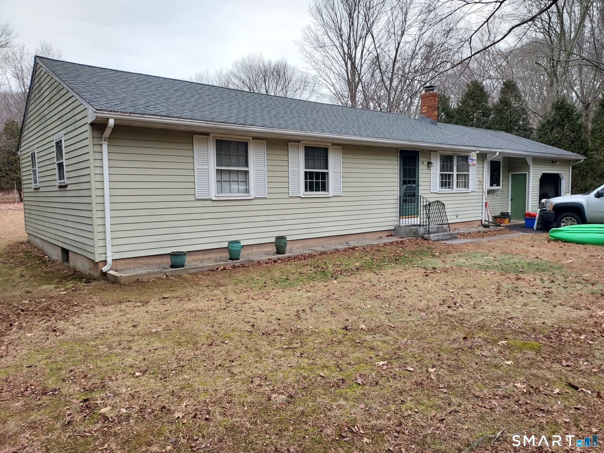 a house view with a backyard space