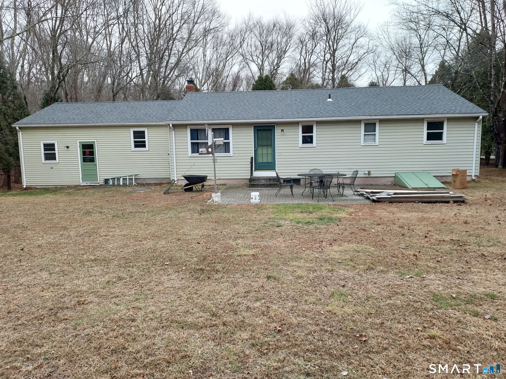 38 Old Middletown Avenue East Hampton, CT 06424 - Photo 2 of 13 a backyard of a house with seating space