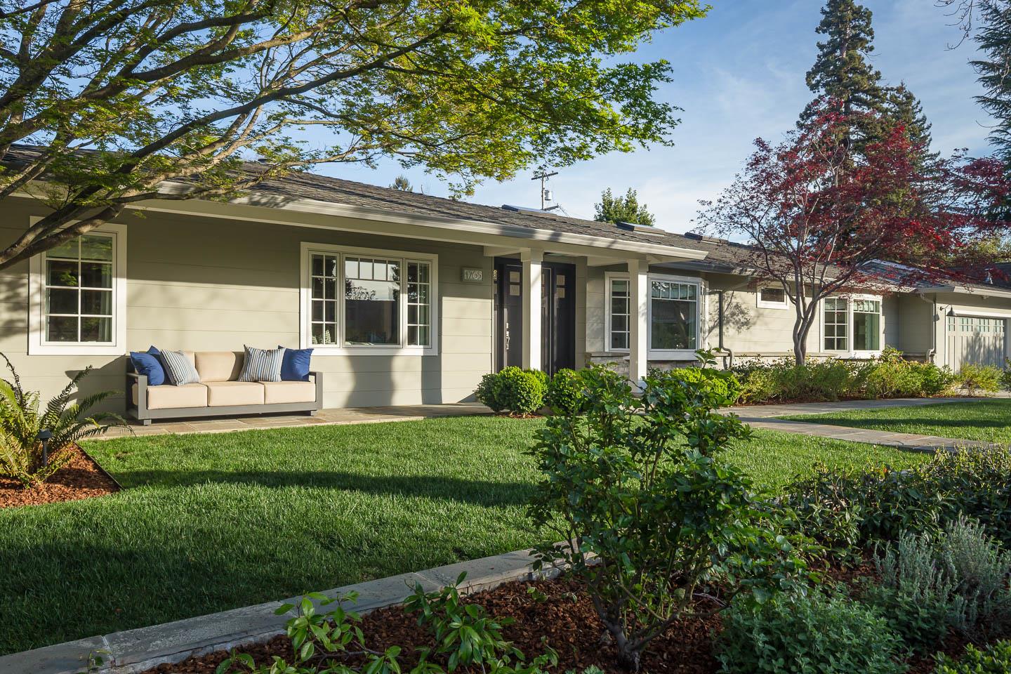 1765 Oak Avenue Menlo Park, CA 94025 - Photo 1 of 1 a front view of a house with a yard table and chairs