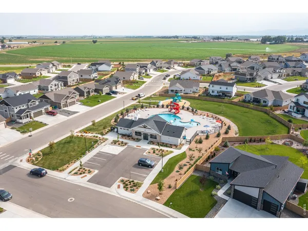 an aerial view of a house with a garden