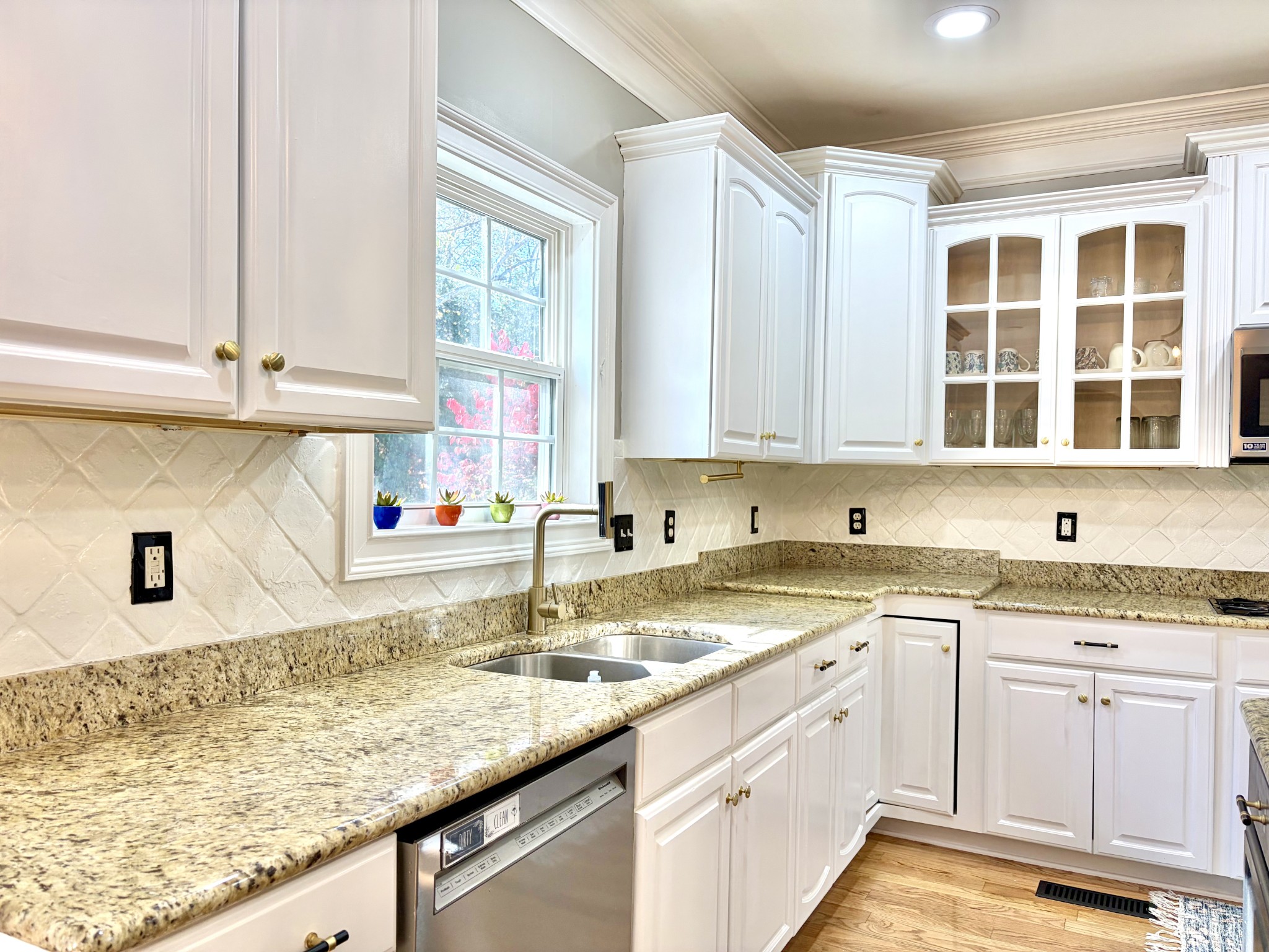 1617 Fair House Road Spring Hill, TN 37174 - Photo 11 of 31 a kitchen with a sink and cabinets