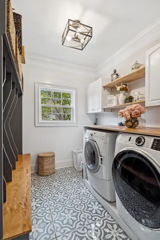 a utility room with dryer and washer