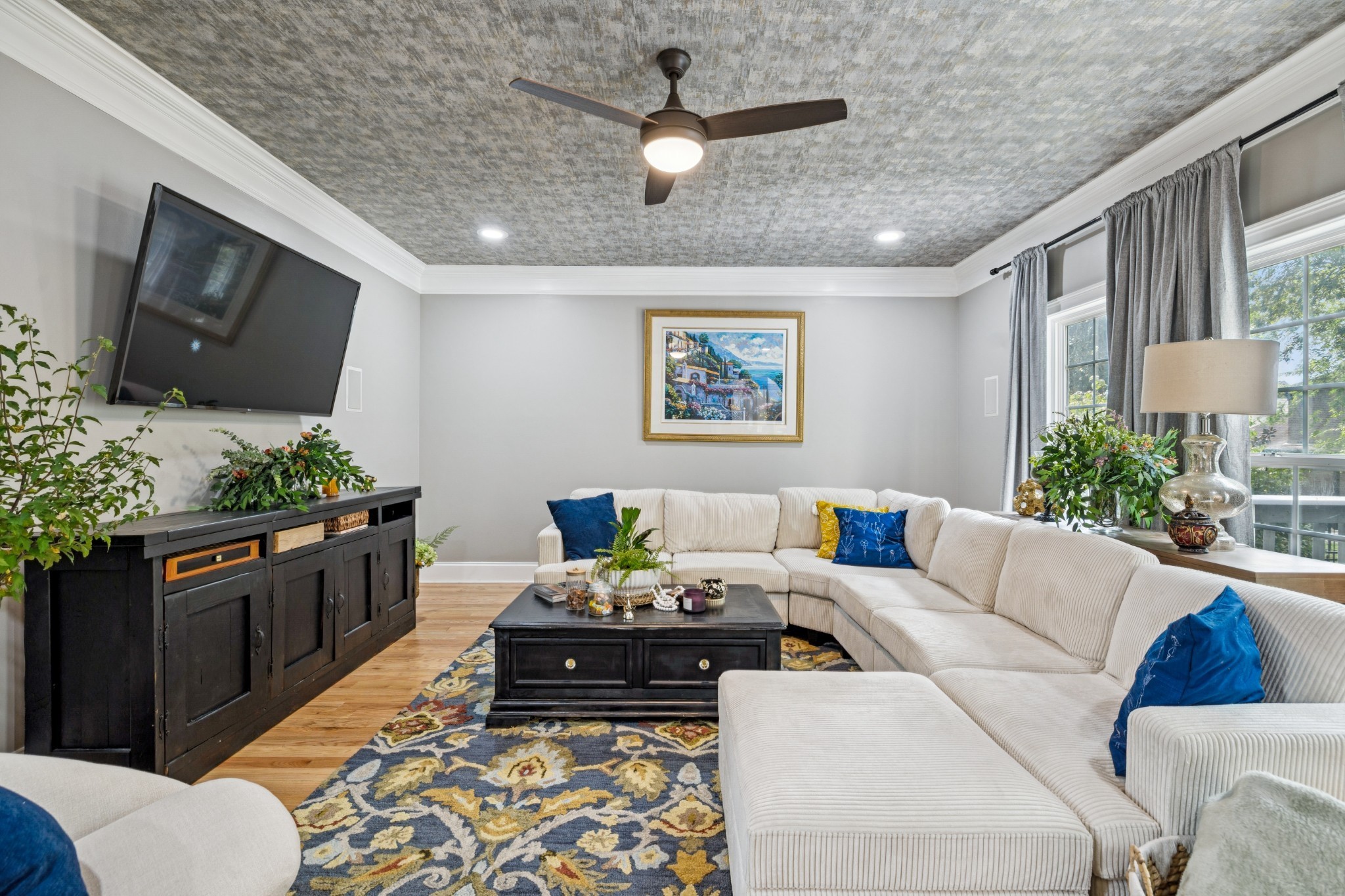1617 Fair House Road Spring Hill, TN 37174 - Photo 8 of 31 a living room with furniture and a flat screen tv
