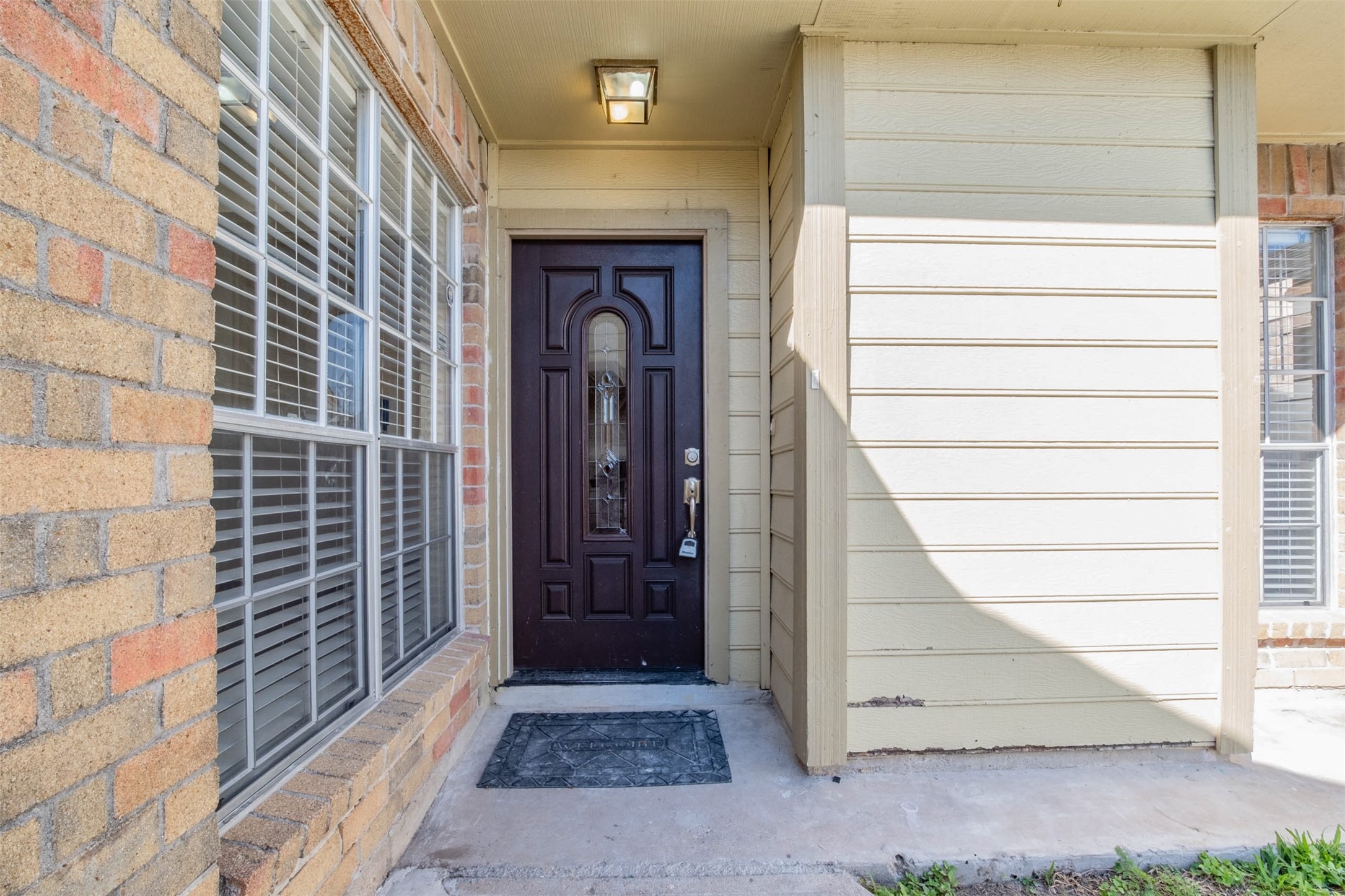 11840 Spring Grove Drive Houston, TX 77099 - Photo 3 of 27 Inviting front door entry with classic brick accents