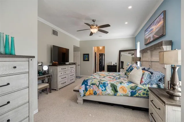 walk in closet with clothes and shoes