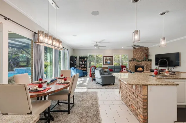 a dining room with furniture and a window