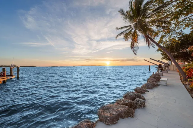 a picture of a book and a bed
