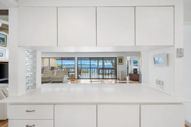 a spacious bedroom with a bed and a table