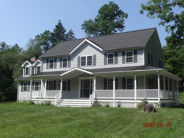 243 Perry Hill Road Acushnet, MA 02743 - Photo 1 of 17 a brick house with a big yard and large trees