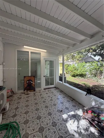 a view of a large window with an outdoor space