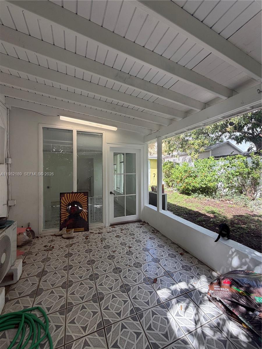 1025 Southwest 12th Street, Unit 2 Miami, FL 33129 - Photo 2 of 13 a view of a large window with an outdoor space