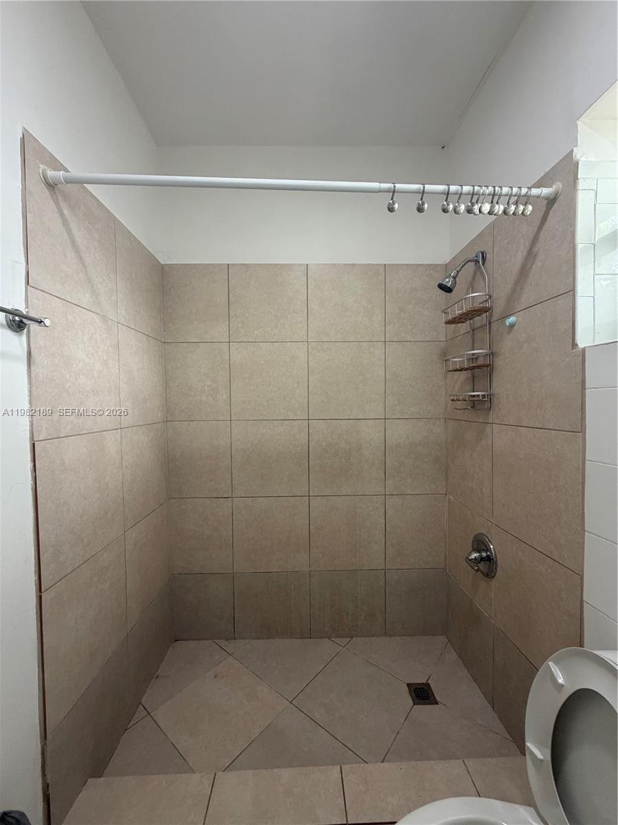 1025 Southwest 12th Street, Unit 2 Miami, FL 33129 - Photo 7 of 13 a bathroom with a shower