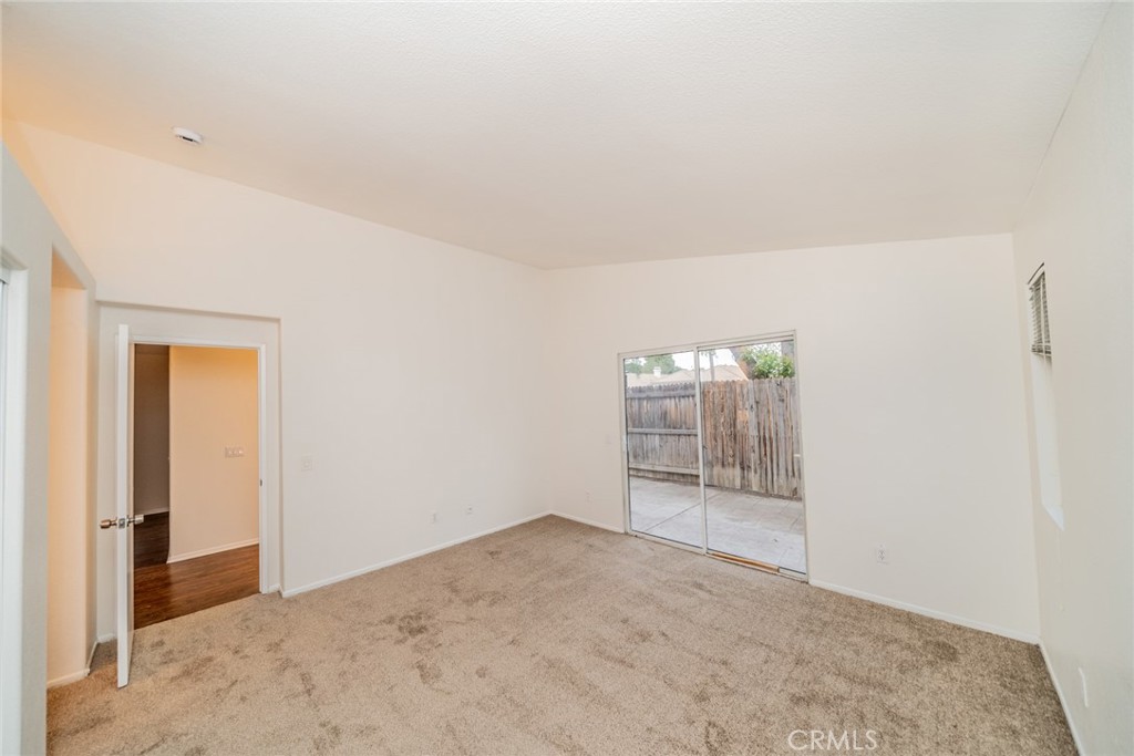 635 Laxford Road San Jacinto, CA 92583 - Photo 11 of 37 an empty room with windows