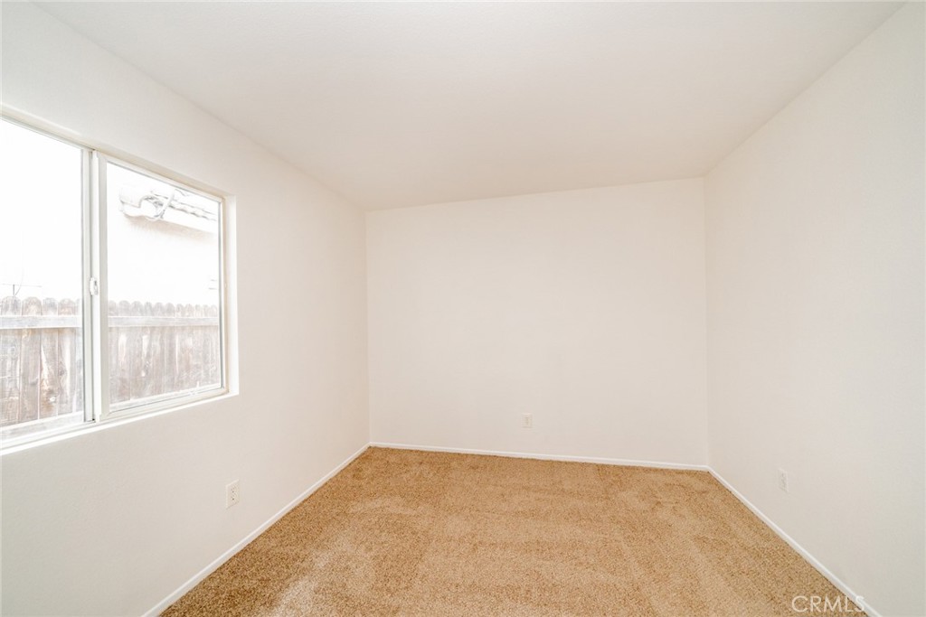 635 Laxford Road San Jacinto, CA 92583 - Photo 27 of 37 an empty room with a window