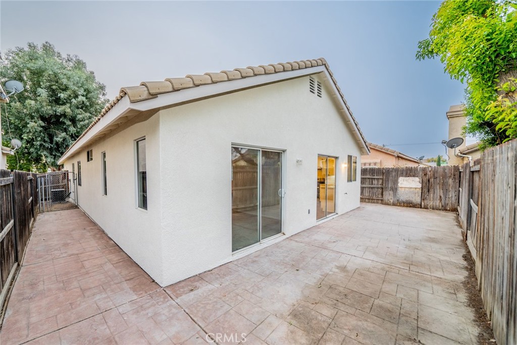 635 Laxford Road San Jacinto, CA 92583 - Photo 31 of 37 a view of a house with a backyard
