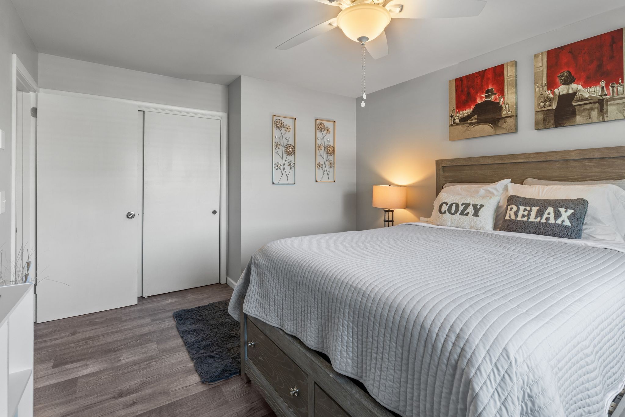 613 Hillsboro Road, Unit A11 Franklin, TN 37064 - Photo 13 of 26 a bedroom with a bed and wooden floor