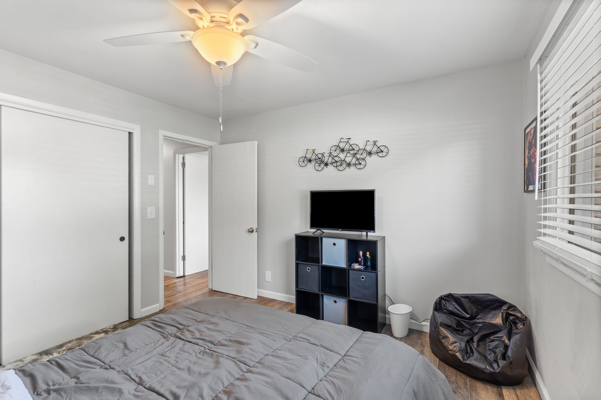 613 Hillsboro Road, Unit A11 Franklin, TN 37064 - Photo 15 of 26 a bedroom with a bed and a flat screen tv