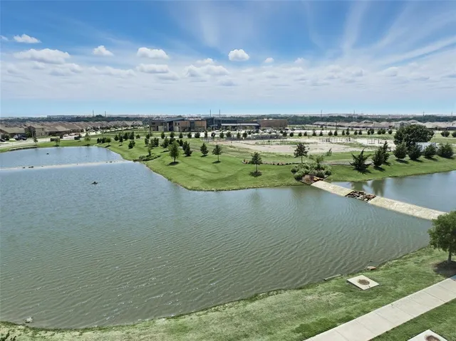 an aerial view of a houses with outdoor space