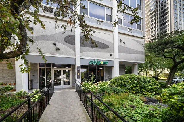 a view of a building with a garden