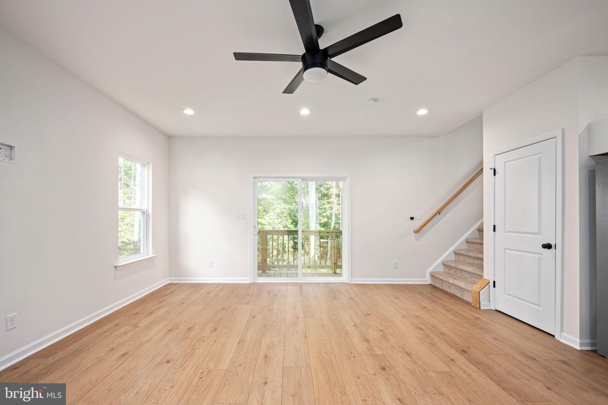 107 Saylers Creek Road Locust Grove, VA 22508 - Photo 24 of 78 a view of empty room with wooden floor and fan