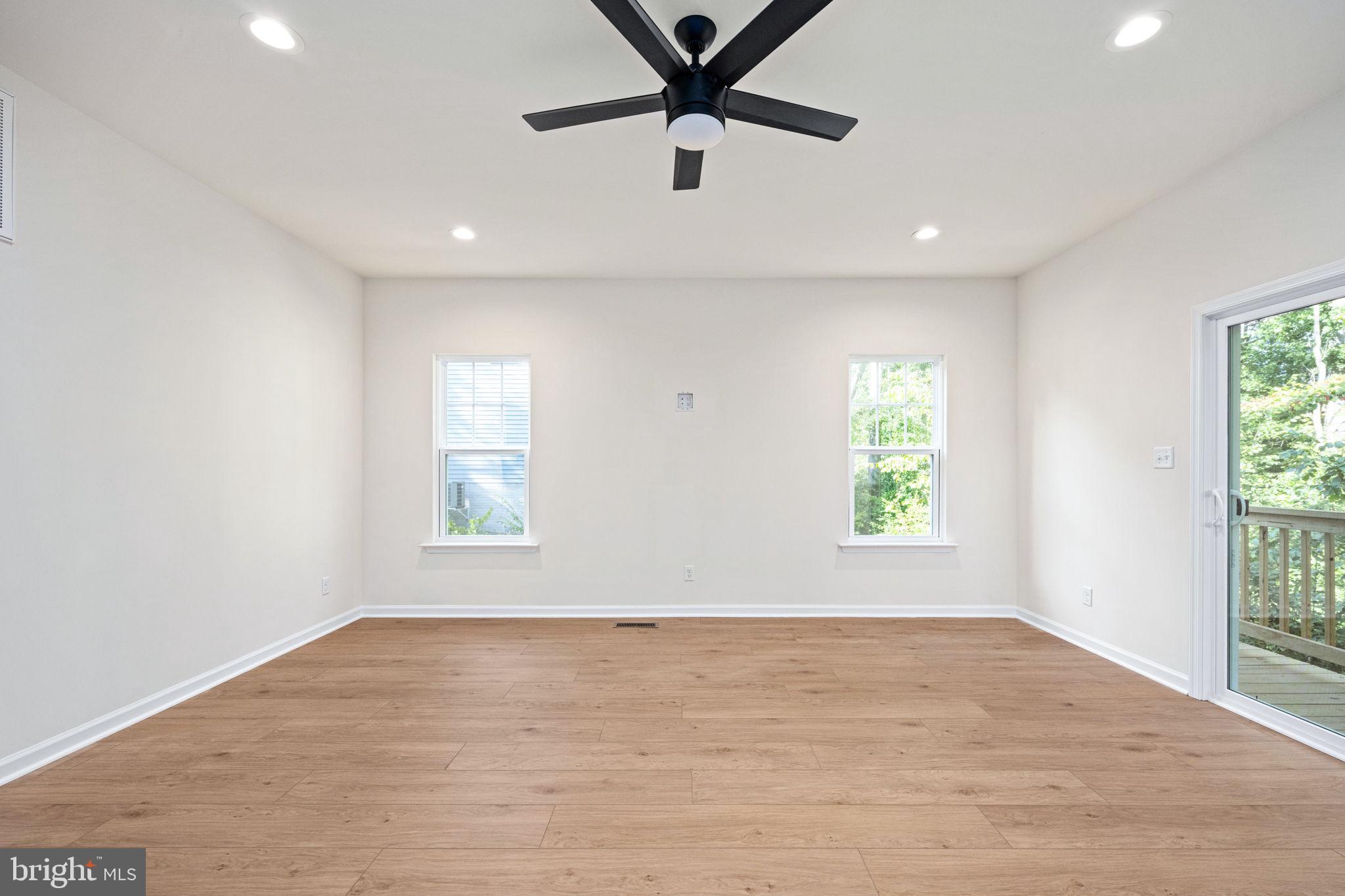 107 Saylers Creek Road Locust Grove, VA 22508 - Photo 25 of 78 wooden floor in an empty room with a window