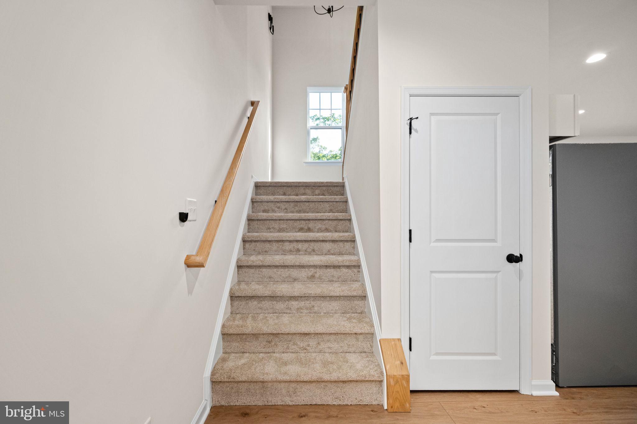 107 Saylers Creek Road Locust Grove, VA 22508 - Photo 30 of 78 a view of a hallway with wooden floor and entryway