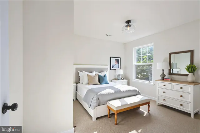 a view of hallway with windows