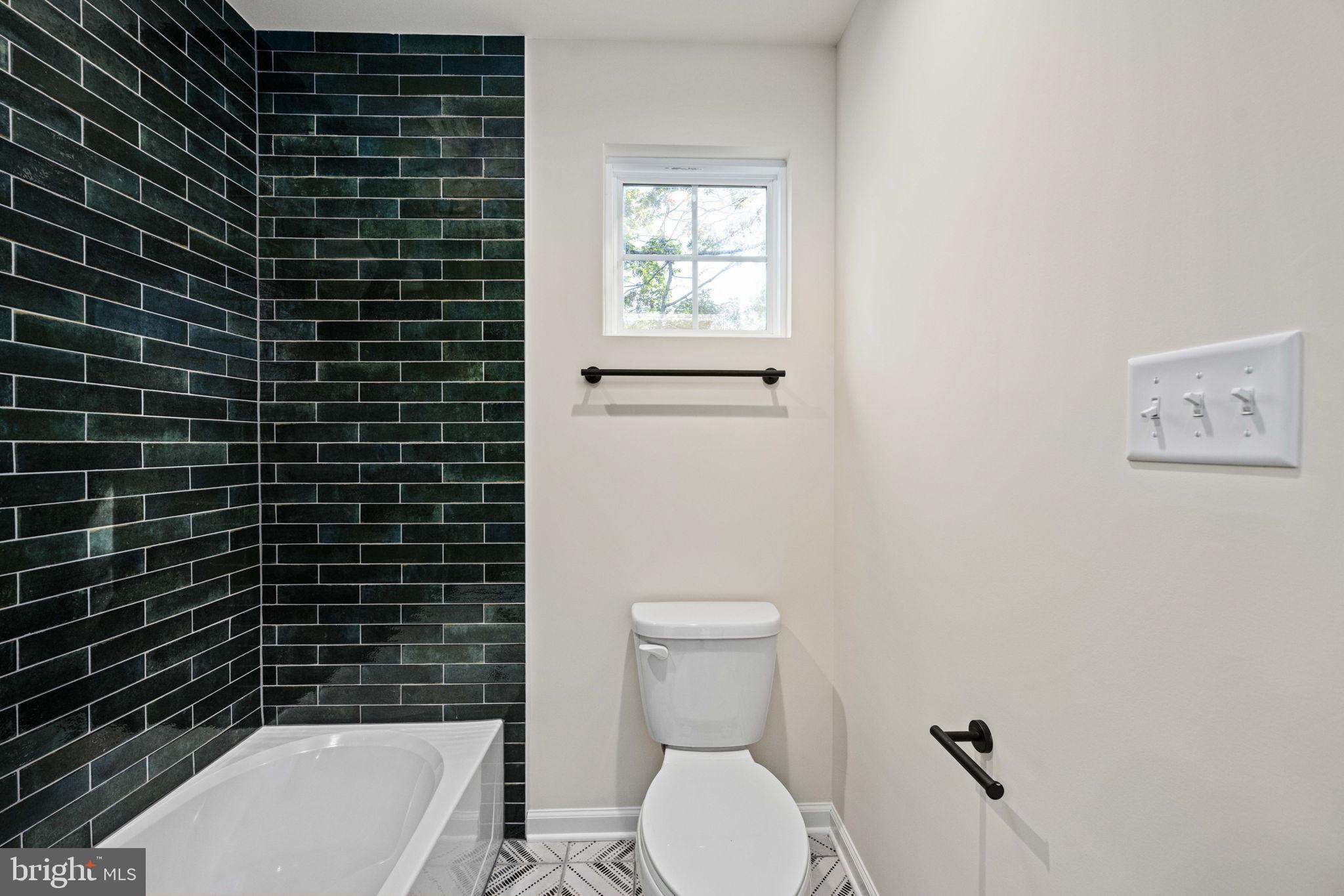 107 Saylers Creek Road Locust Grove, VA 22508 - Photo 44 of 78 a bathroom with a toilet and a shower
