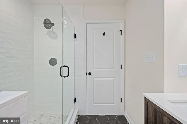 a view of brick house with a large window and large windows