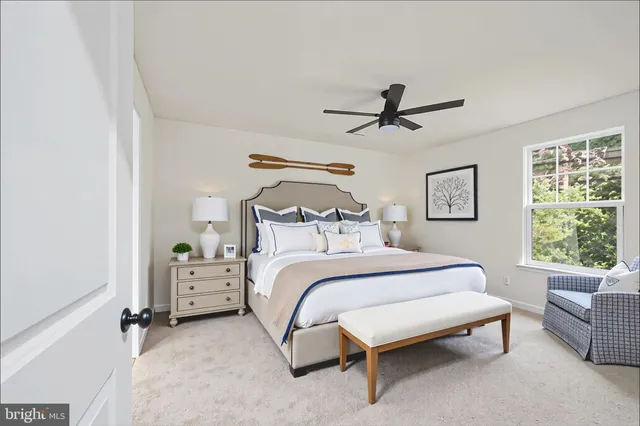 a view of brick house with a large window and large windows