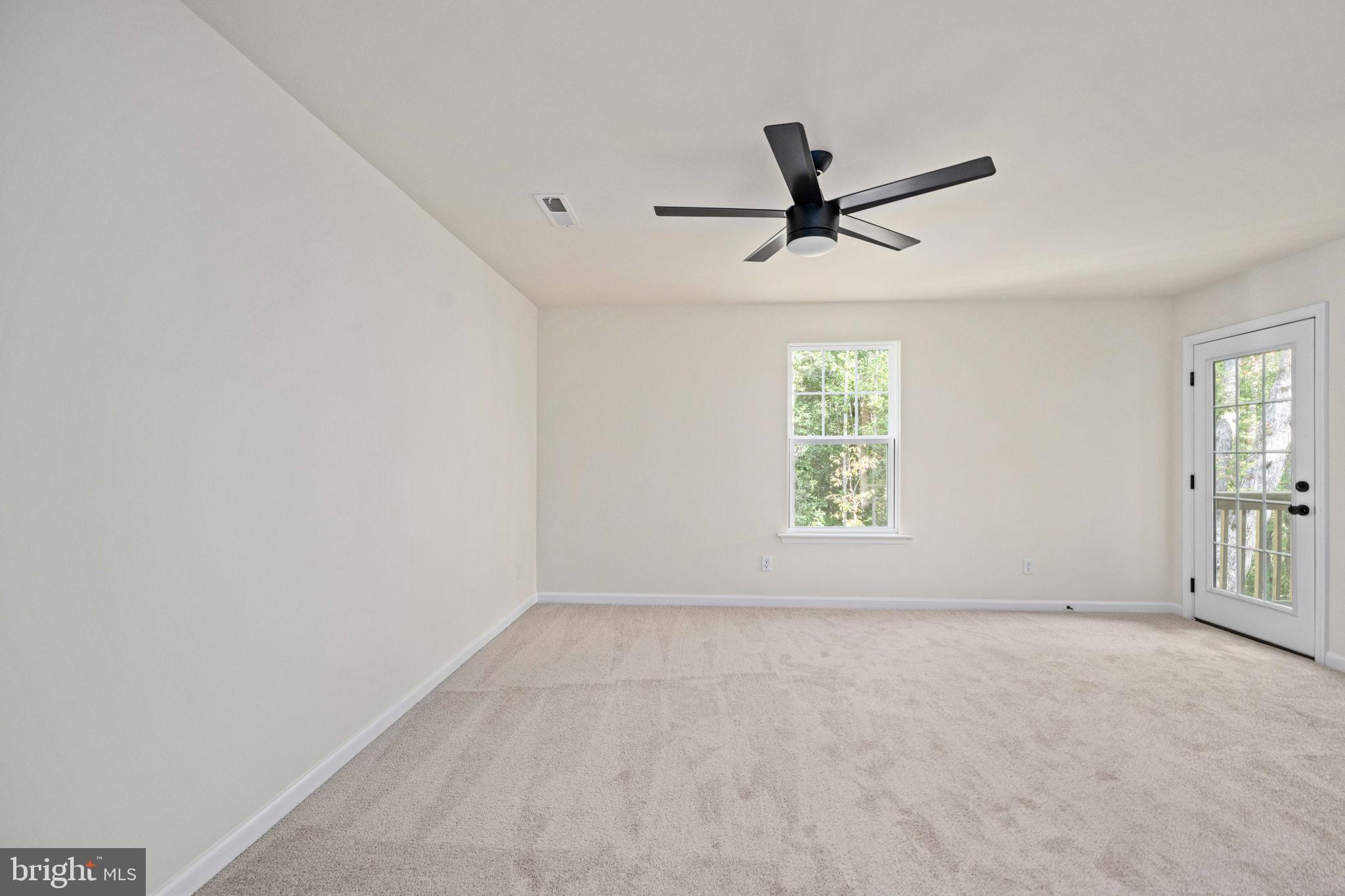 107 Saylers Creek Road Locust Grove, VA 22508 - Photo 52 of 78 wooden floor in an empty room with a window