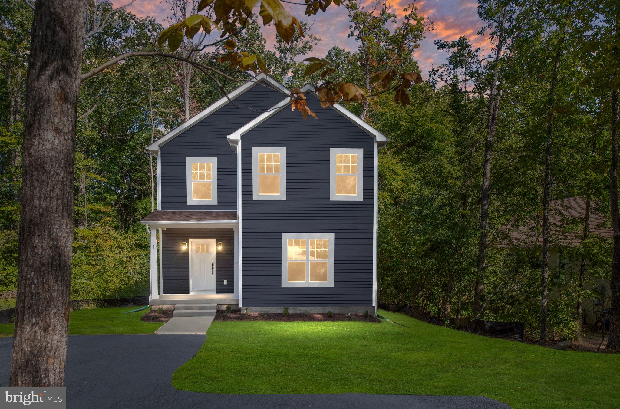 107 Saylers Creek Road Locust Grove, VA 22508 - Photo 69 of 78 a front view of a house with garden