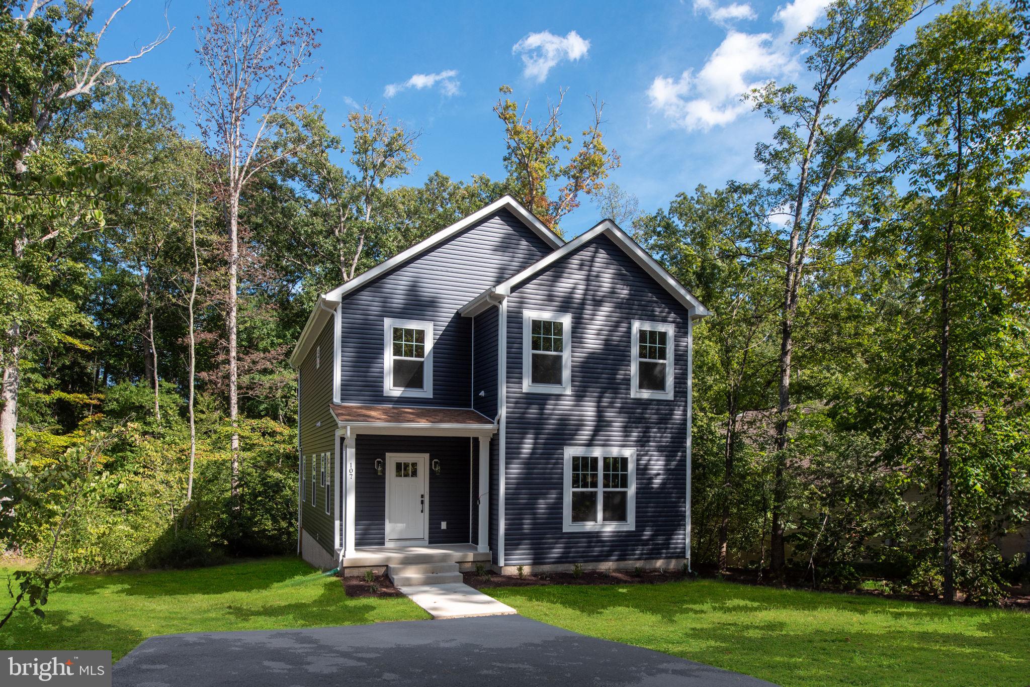 107 Saylers Creek Road Locust Grove, VA 22508 - Photo 74 of 78 a front view of a house with a yard