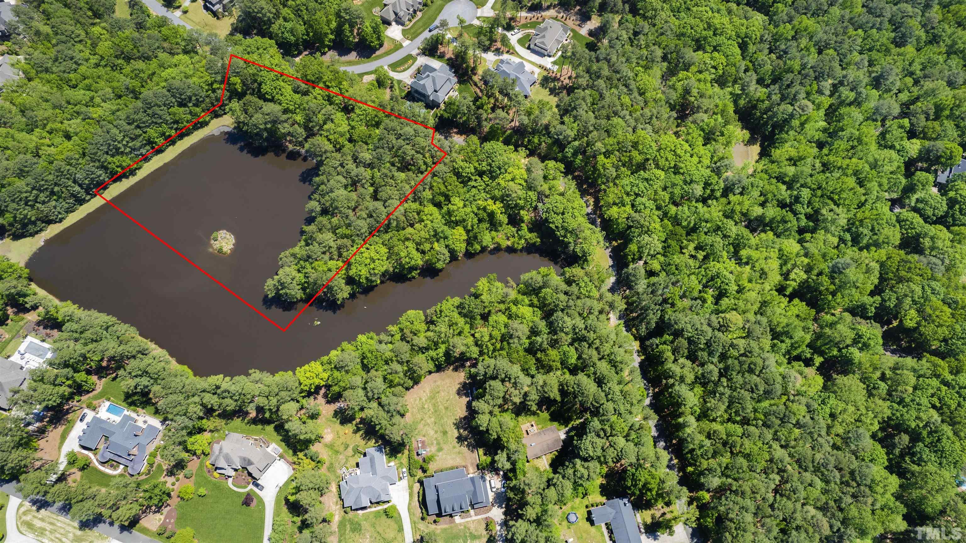 325 Pasture Lane Raleigh, NC 27614 - Photo 9 of 12 an aerial view of a house with a yard and garden