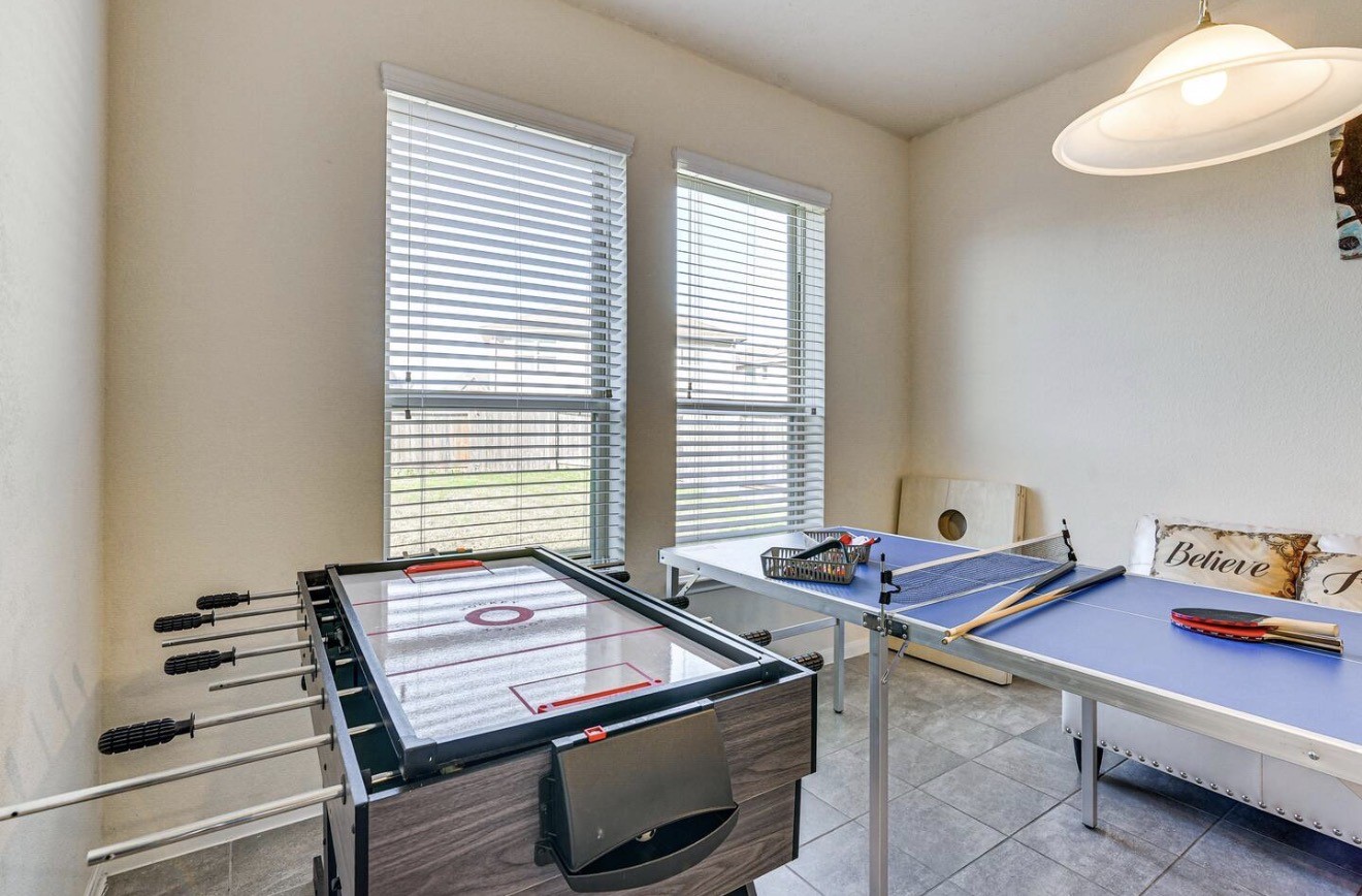 15015 Winter Valley Court Humble, TX 77396 - Photo 13 of 39 a room with chairs and a window