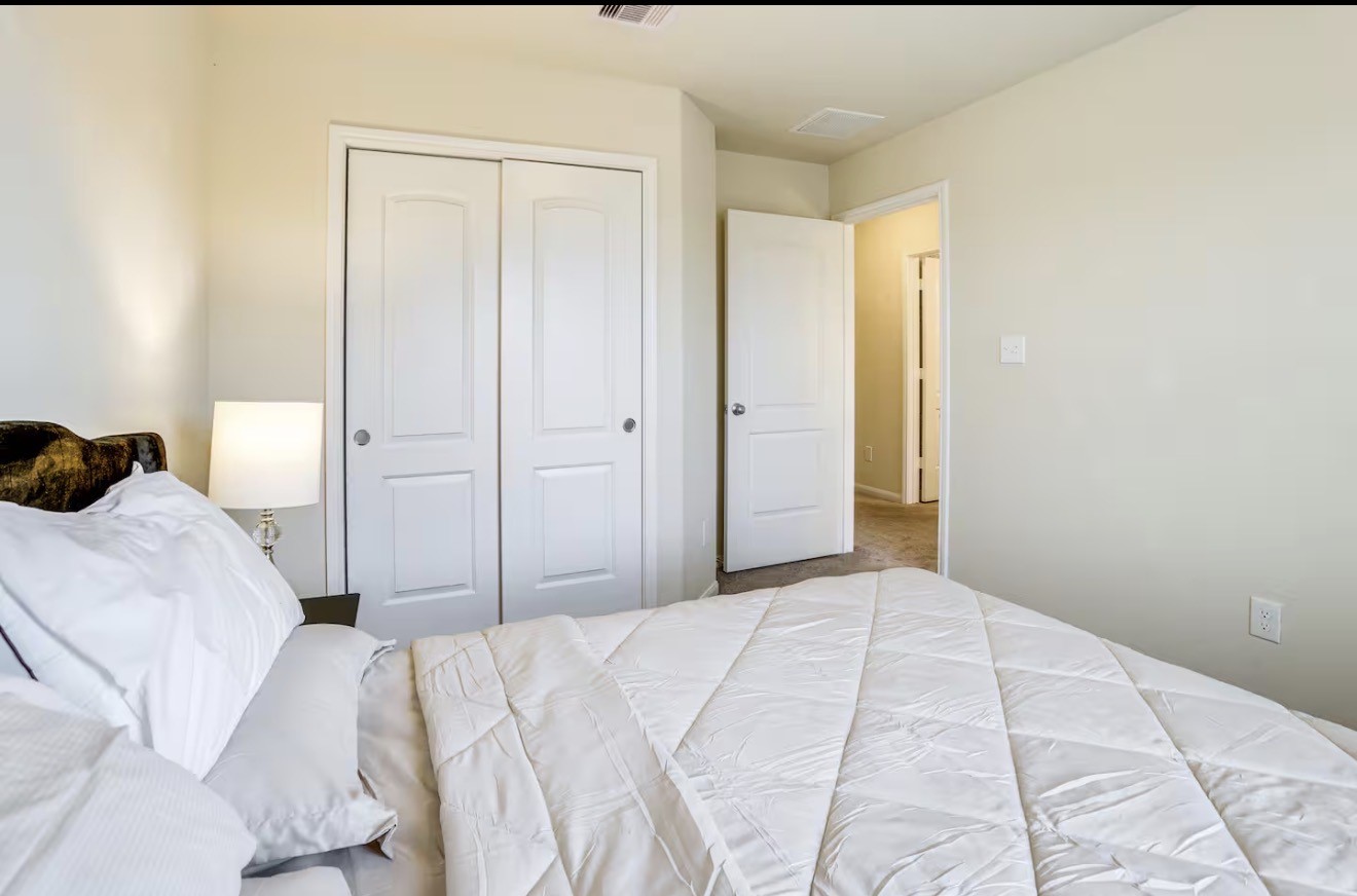 15015 Winter Valley Court Humble, TX 77396 - Photo 29 of 39 a bedroom with a bed and a window