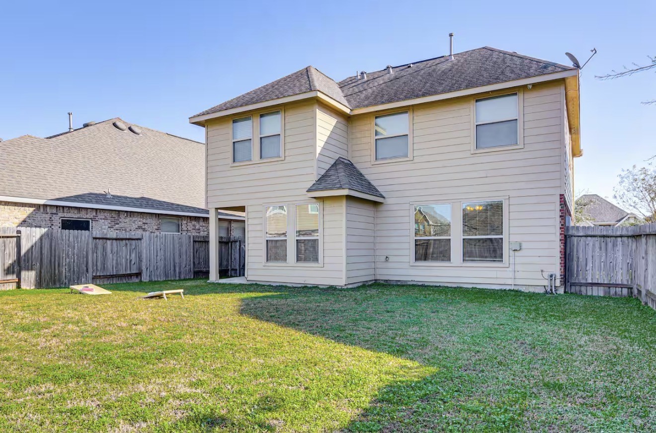 15015 Winter Valley Court Humble, TX 77396 - Photo 3 of 39 a view of a house with a yard and sitting area