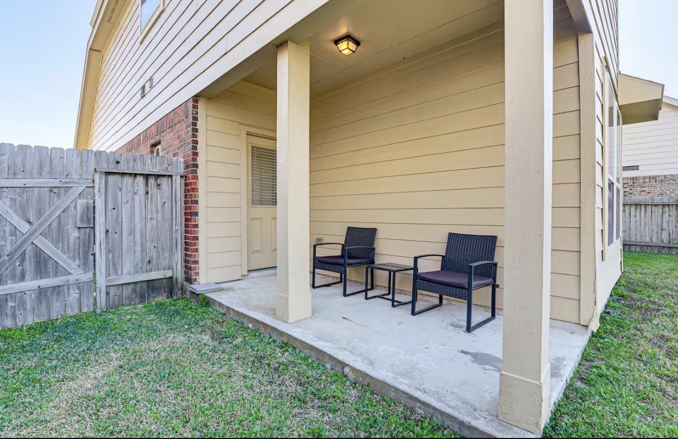 15015 Winter Valley Court Humble, TX 77396 - Photo 33 of 39 a view of a house with backyard and sitting area