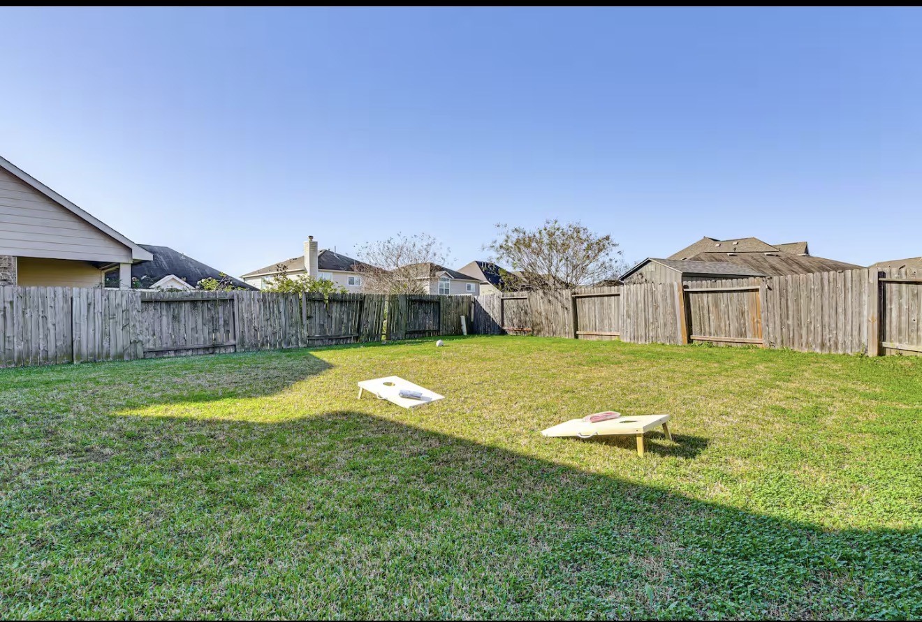 15015 Winter Valley Court Humble, TX 77396 - Photo 34 of 39 a swimming pool with outdoor seating and yard