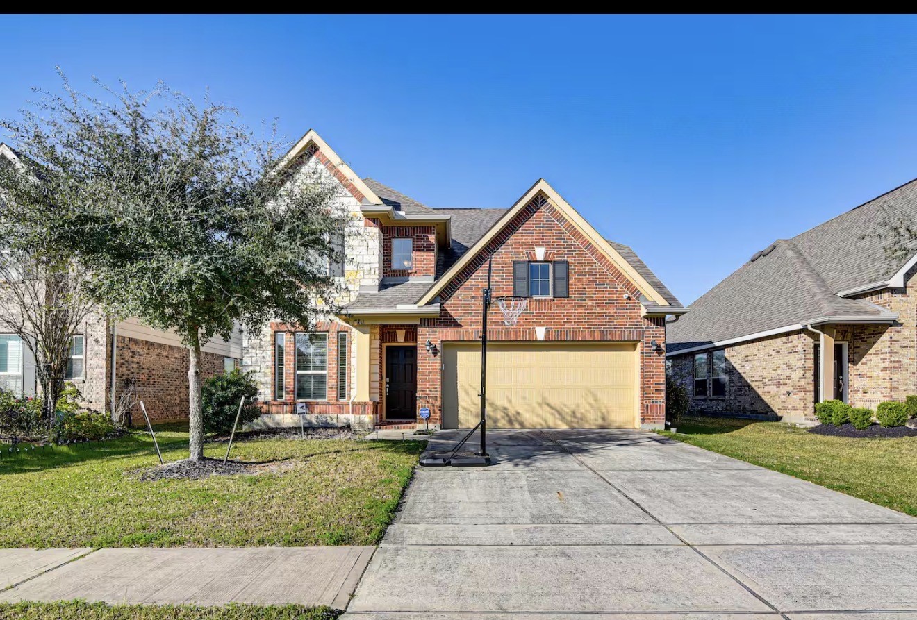 15015 Winter Valley Court Humble, TX 77396 - Photo 37 of 39 a front view of a house with a yard