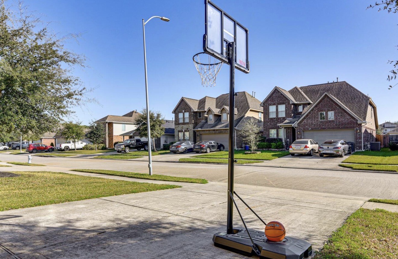 15015 Winter Valley Court Humble, TX 77396 - Photo 39 of 39 a view of a street with houses