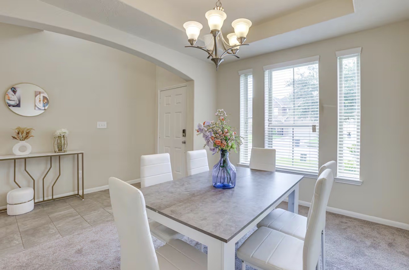 15015 Winter Valley Court Humble, TX 77396 - Photo 6 of 39 a view of a dining room with furniture window and outside view