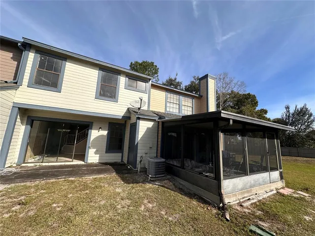a front view of a building with garden