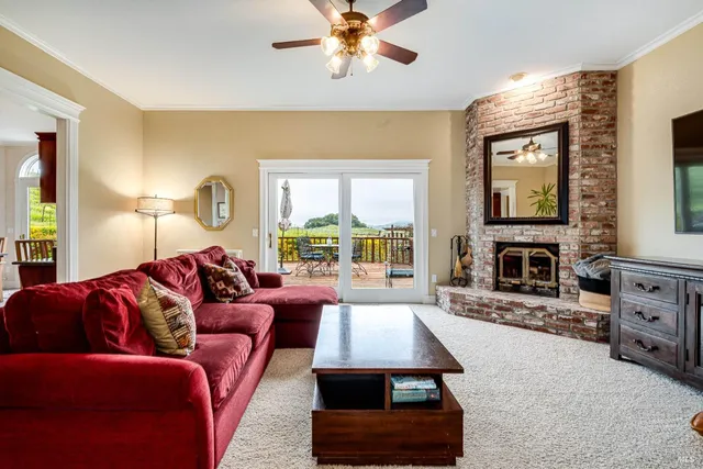 a bedroom with a bed and a fireplace