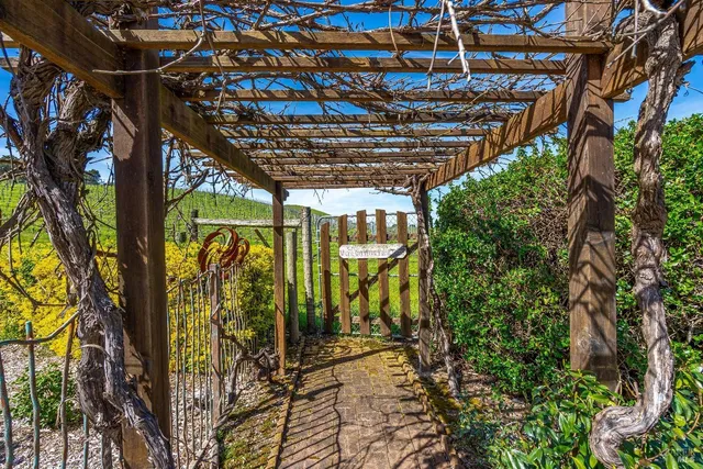 a bed room with a bed and a chandelier